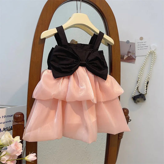 Black bow pom pom dress